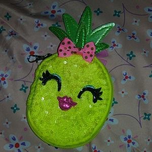 A pinnapple money or key bag